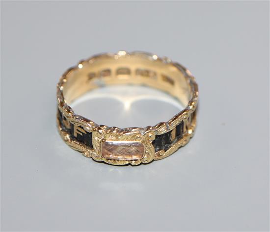 A Victorian 18ct gold, black enamel and plaited hair In Memory Of mourning band, with inscription, size O.